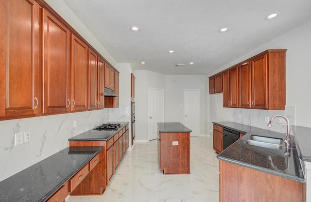 kitchen with decorative backsplash, dark stone counters, sink, black dishwasher, and a kitchen island