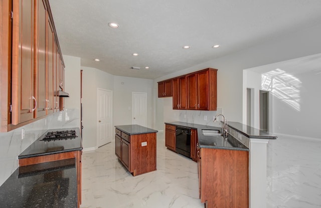 kitchen with dishwasher, sink, kitchen peninsula, stainless steel gas stovetop, and a kitchen island