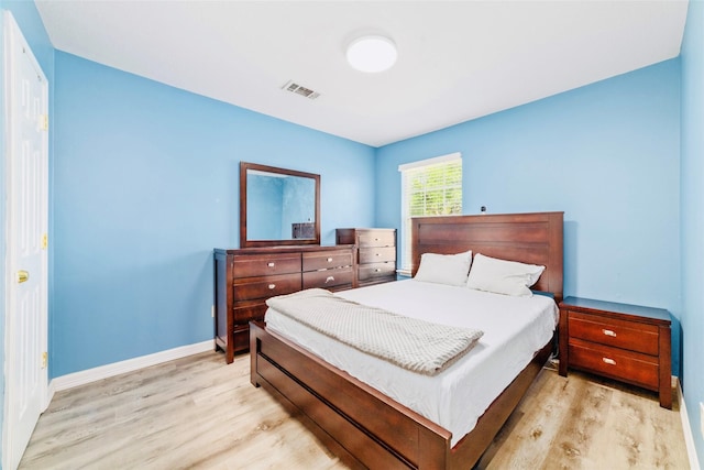 bedroom featuring light wood-type flooring