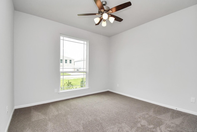 unfurnished room featuring carpet flooring and ceiling fan