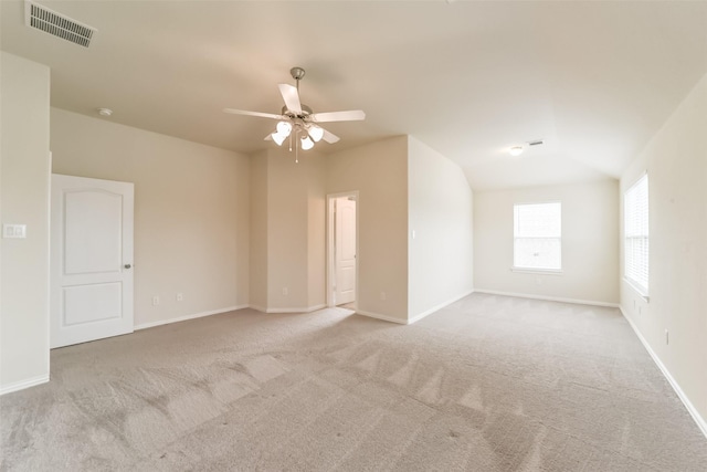 unfurnished room featuring ceiling fan and light colored carpet