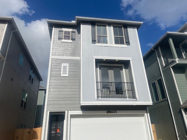 view of front of home with a garage