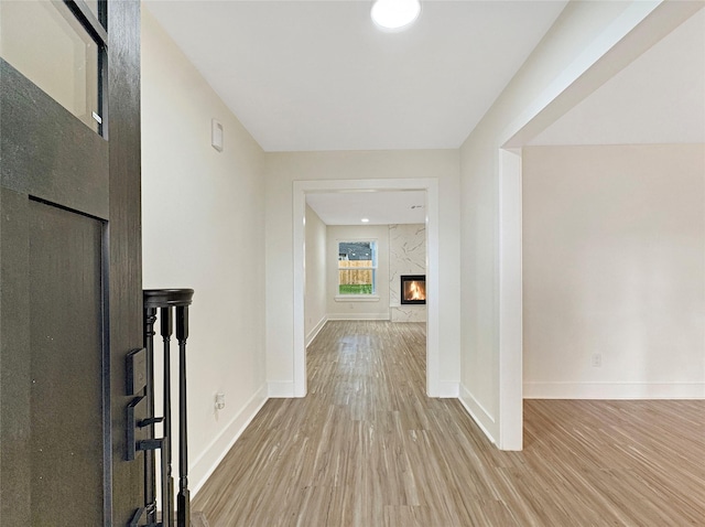 corridor featuring light wood-type flooring