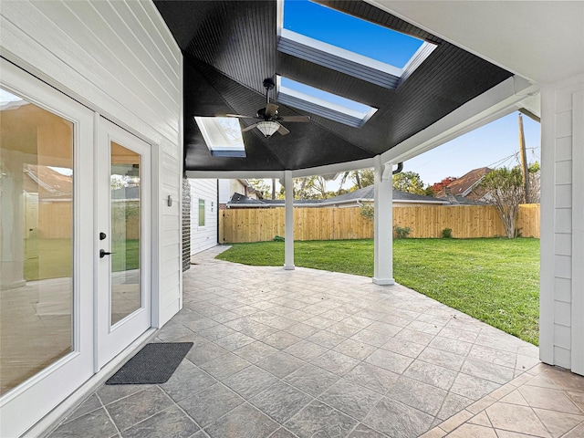 view of patio / terrace featuring ceiling fan and french doors