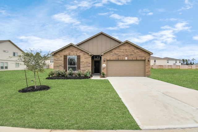 view of front of house featuring a garage and a front yard