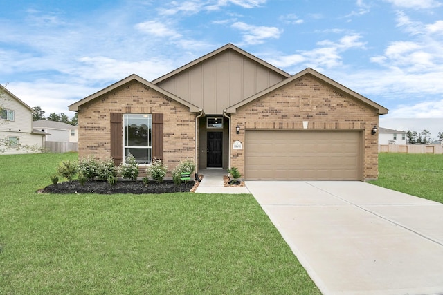 view of front of property with a front lawn and a garage