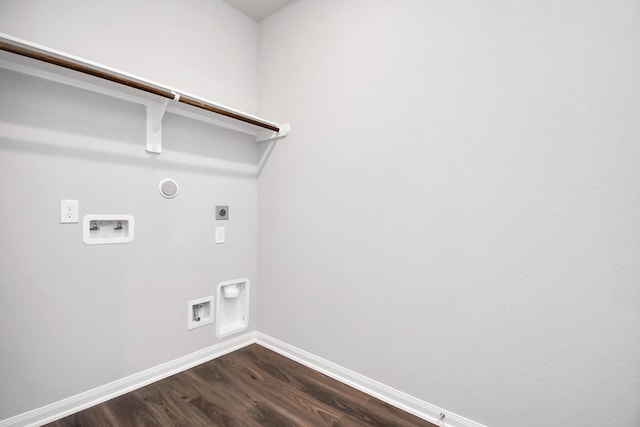 washroom featuring hookup for an electric dryer, hookup for a gas dryer, dark wood-type flooring, and hookup for a washing machine