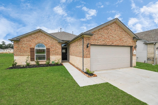 view of front of house featuring a front yard and a garage