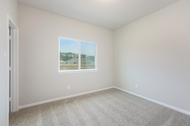 unfurnished room with carpet