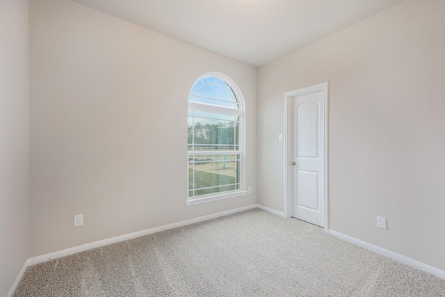 view of carpeted spare room