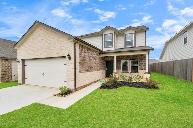 view of front of home featuring a garage and a front yard