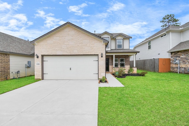 view of front of property featuring a front lawn and a garage