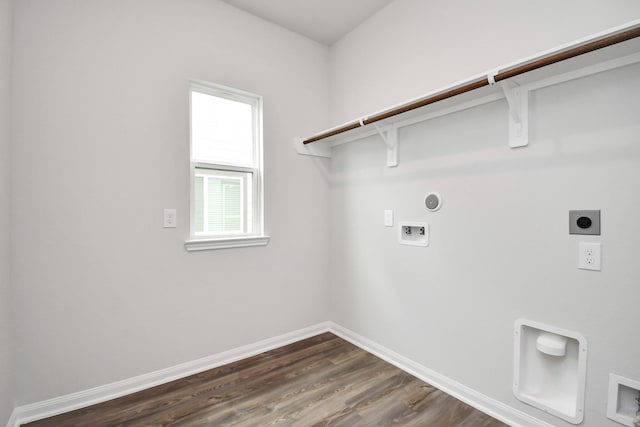 laundry room with hookup for a washing machine, dark hardwood / wood-style floors, and hookup for an electric dryer