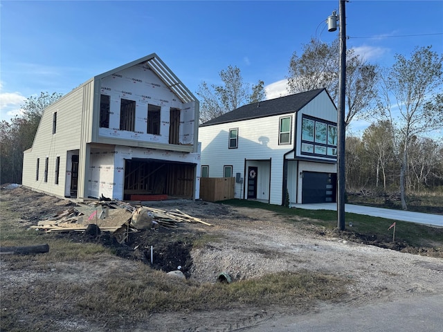 view of front of property featuring a garage