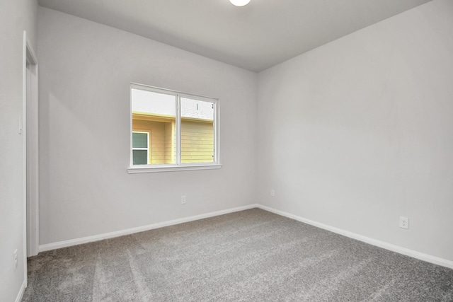 empty room featuring carpet floors