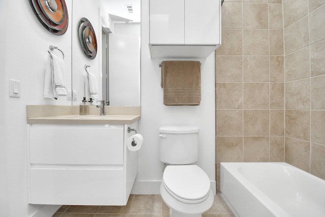 full bathroom featuring tile patterned flooring, vanity, toilet, and shower / tub combination