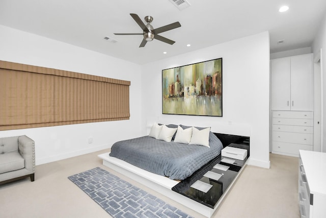 carpeted bedroom with ceiling fan