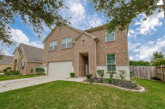 view of front of house with a garage and a front lawn