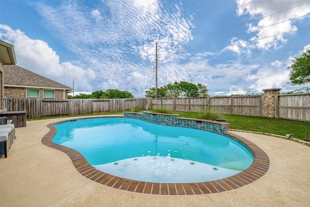 view of pool featuring a yard