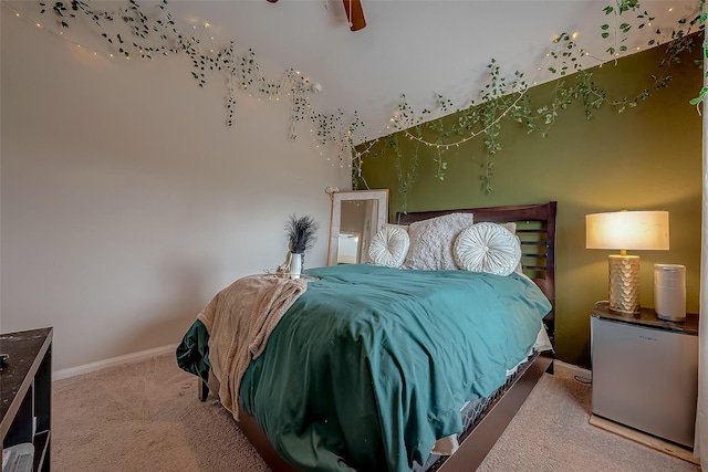 carpeted bedroom featuring fridge