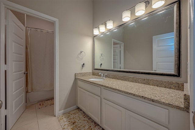 bathroom with vanity, tile patterned floors, and shower / bathtub combination with curtain