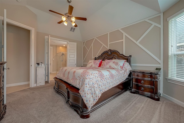 carpeted bedroom with ceiling fan and lofted ceiling