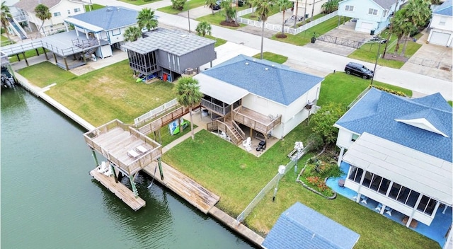 drone / aerial view featuring a water view