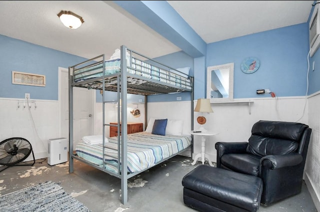 bedroom with concrete flooring