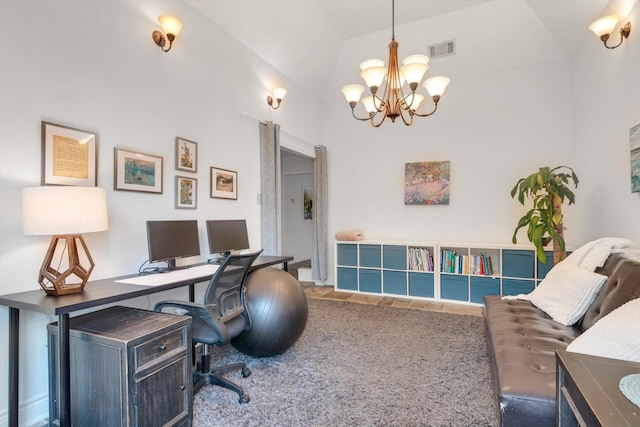 office area with lofted ceiling and a chandelier