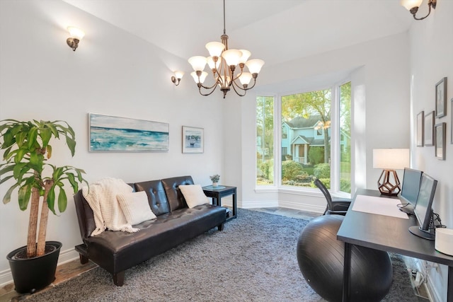 living room with wood-type flooring, a chandelier, and a healthy amount of sunlight