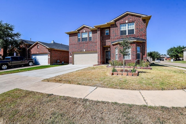 front of property with a front yard and a garage