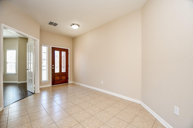 view of tiled foyer entrance