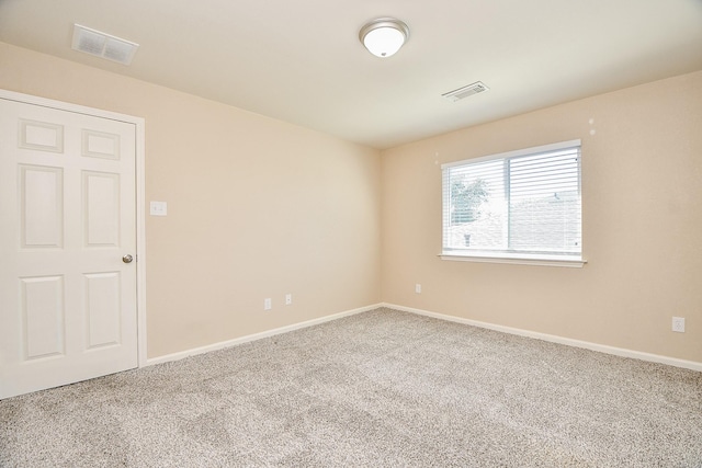 view of carpeted spare room