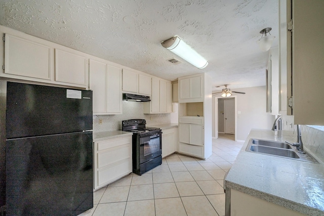 kitchen with black appliances, white cabinets, sink, ceiling fan, and light tile patterned floors