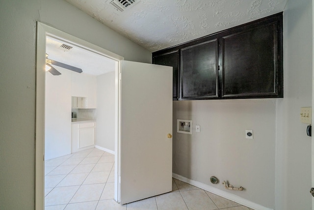 laundry area featuring electric dryer hookup, hookup for a gas dryer, hookup for a washing machine, ceiling fan, and light tile patterned floors