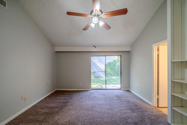 unfurnished room featuring a textured ceiling, light carpet, and vaulted ceiling