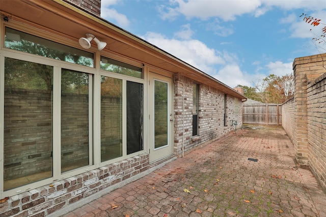 view of home's exterior with a patio