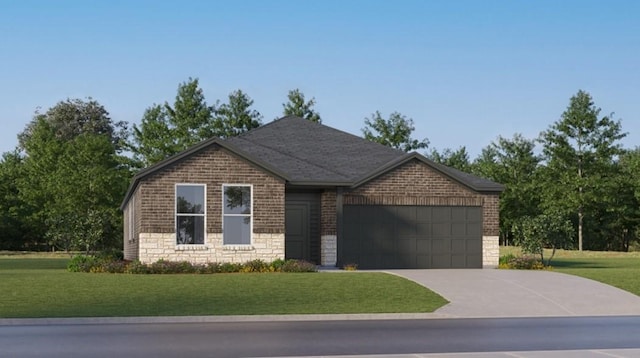 view of front of property featuring a garage and a front lawn