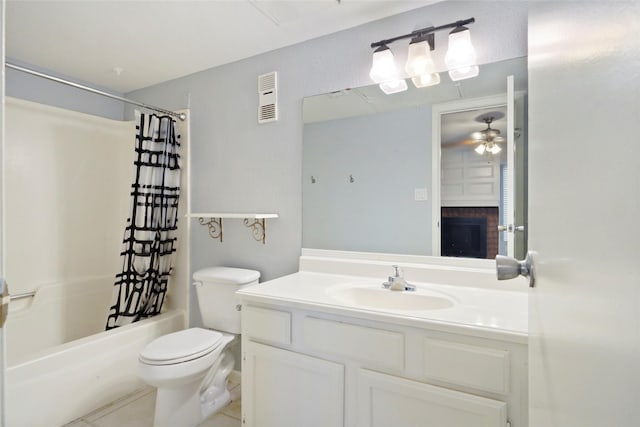 full bathroom with vanity, tile patterned floors, shower / bath combination with curtain, ceiling fan, and toilet