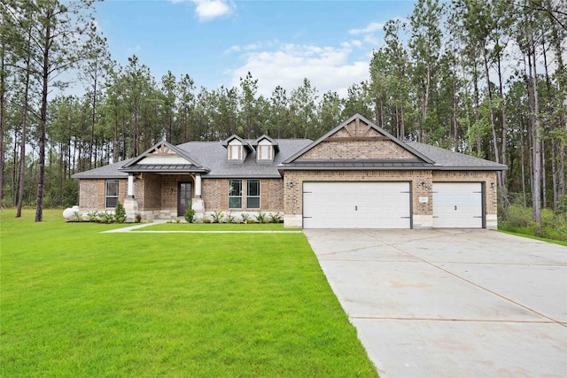 craftsman-style home with a front yard and a garage