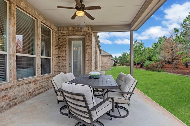 view of patio / terrace featuring ceiling fan