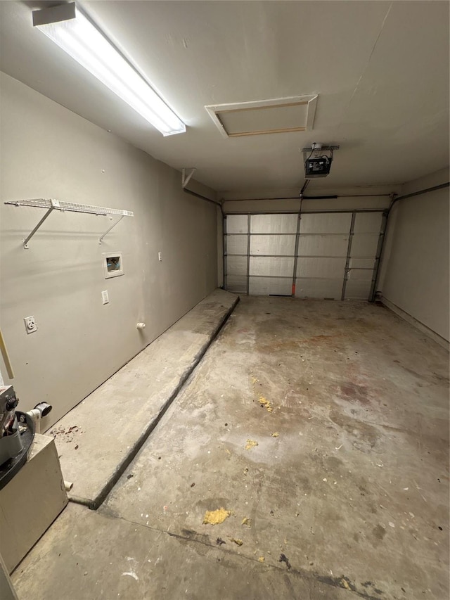 garage featuring a garage door opener