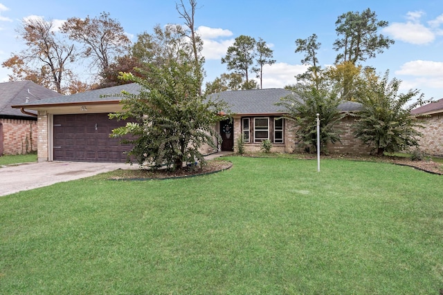 ranch-style home featuring a front yard and a garage