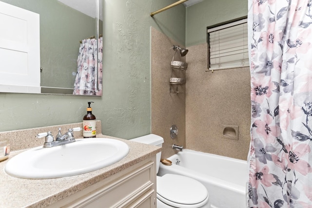 full bathroom featuring vanity, shower / tub combo, and toilet