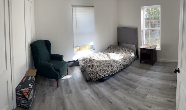 bedroom featuring wood finished floors