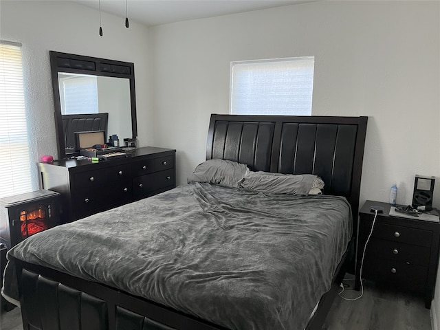 bedroom with wood finished floors