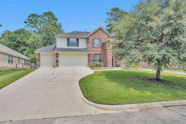 view of front of house with a garage and a front lawn