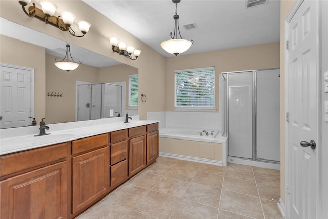 bathroom with separate shower and tub, tile patterned floors, and vanity