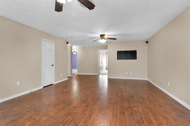 unfurnished room with dark hardwood / wood-style floors and ceiling fan