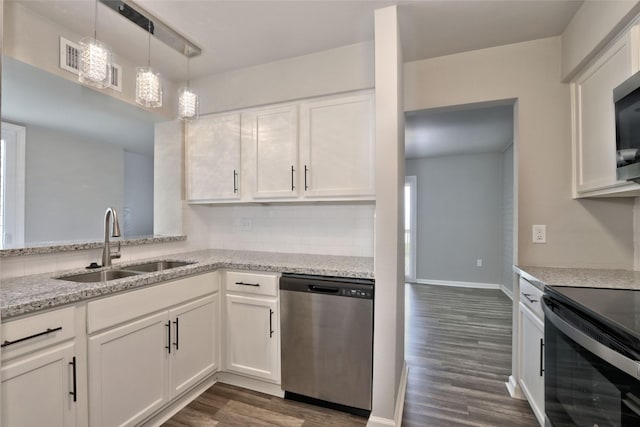 kitchen featuring dishwasher and white cabinetry